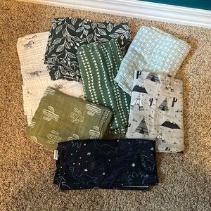 Bundle of 6 Muslin style swaddles and a car seat cover/ nursing cover up.